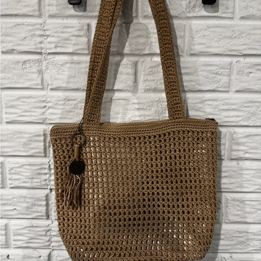 The Sak gold metallic hobo slouch bag